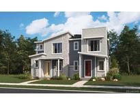 Modern two-story townhomes featuring stone accents and colorful front doors with well-maintained landscaping at 17095 E Alameda Pkwy, Aurora, CO 80017