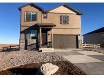 Two-story house with stone accents and a large driveway at 3319 Belleville Ridge Rd, Elizabeth, CO 80107