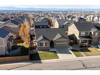 Beautiful single-Gathering home with manicured lawn and mountain views in a desirable neighborhood at 14189 St Paul St, Thornton, CO 80602