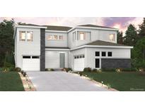 Charming two-story home featuring a three car garage and modern architectural details at 1840 Morgan Dr, Erie, CO 80516