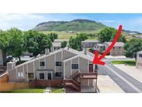 Charming townhome with a private entrance, mature trees, and mountain views at 18274 W 58Th Pl # 37, Golden, CO 80403