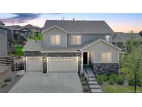 Beautiful two-story home featuring a three-car garage and charming stone accents, set in a desirable neighborhood at 6630 S Coolidge Ct, Aurora, CO 80016