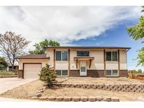 Charming two-story home featuring a combination of traditional and modern architecture at 261 Linda Ln, Denver, CO 80221