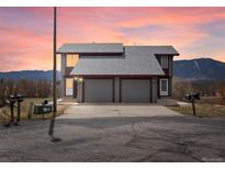 Charming two-story home with two-car garage and mountain views at sunset at 760 Century Pl # A, Monument, CO 80132