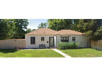 Charming single-story home with manicured lawn and inviting curb appeal at 3132 E Florida Ave, Denver, CO 80210