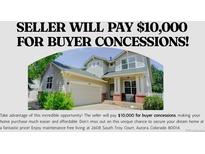 Charming two-story home with a well-manicured front yard and inviting entrance at 2608 S Troy Ct, Aurora, CO 80014
