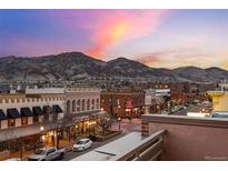 Beautiful aerial view of town with mountains and sunset providing a scenic backdrop at 1275 Washington Ave, Golden, CO 80401