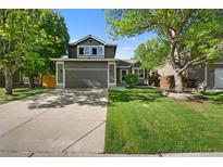 Charming two-story home with a well-maintained lawn and inviting curb appeal at 2667 E 132Nd Ave, Thornton, CO 80241