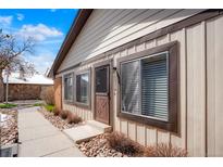 Charming home exterior features a quaint entrance and rock landscaping at 16035 E Ithaca Pl # D, Aurora, CO 80013