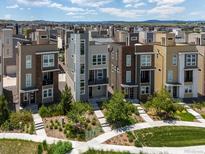 Stunning multi-story home featuring modern design and professional landscaping in a vibrant neighborhood setting at 3654 Penang Dr, Castle Rock, CO 80109