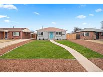 Charming single-story home with a well-manicured lawn and a bright turquoise front door at 3630 Magnolia St, Denver, CO 80207