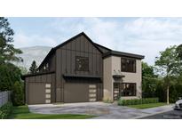 Modern two-story home with a two-car garage and stylish gray and black exterior at 1227 N Ford St, Golden, CO 80403