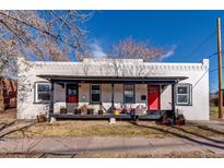 Charming exterior with a cozy front porch featuring two entrances and space for outdoor seating at 723 W 5Th Ave, Denver, CO 80204