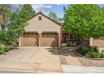 Charming single-Gathering home with a two-car garage and well-maintained landscaping at 6143 E Hinsdale Ave, Centennial, CO 80112