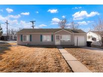 Charming single-story home with neutral siding and a well-maintained front yard at 3299 S Forest St, Denver, CO 80222