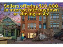 Inviting exterior of stone-clad multi-Gathering home, sellers offering $10,000 towards closing costs at 1610 N Humboldt St # 1/2, Denver, CO 80218