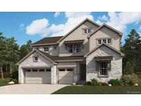 Charming two-story home featuring stone accents and a three-car garage, offering both style and functionality at 2650 Bitterroot Pl, Highlands Ranch, CO 80129