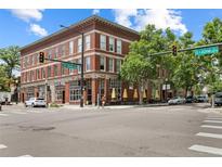 Charming brick building with large windows, street view, and convenient urban location at 3211 Zuni St # 9, Denver, CO 80211