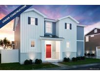 Two-story home with red door, white and gray siding, and landscaping at 22311 E 38Th Pl, Aurora, CO 80019