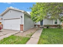 Charming single-Gathering home with two-car garage and a well-manicured lawn in a quiet neighborhood at 1390 W 78Th Cir, Denver, CO 80221