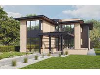 Modern two-story home with landscaped yard and attached garage at 2435 S Josephine St, Denver, CO 80210