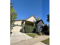 Charming single-Gathering home featuring a two-car garage, well-maintained lawn, and mature landscaping at 19 S 45Th Ave, Brighton, CO 80601