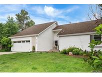 Charming single-Gathering home with a well-maintained lawn, two car garage, and inviting curb appeal at 6686 E Jamison Ave, Centennial, CO 80112