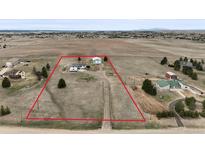 Expansive lot with mature trees, an outbuilding, and a home in a rural setting, perfect for country living at 2845 Cherry Way, Parker, CO 80138