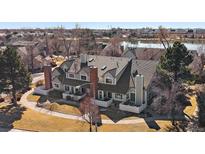 Charming townhome with a well-maintained front yard and picturesque lake view in a desirable community at 1080 E 130Th Ave # A, Thornton, CO 80241