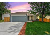 Charming single-Gathering home with a well-manicured lawn and two-car garage at 11510 Otis St, Westminster, CO 80020