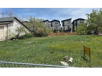 View of modern homes on grassy lot featuring a mix of modern architecture at 5375 W 60Th Ave, Arvada, CO 80003