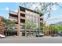 Titanium building exterior with multiple stories, balconies, and many windows at 1720 Wazee St # 2B, Denver, CO 80202