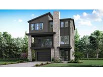 New modern three-story home with stone accents and a two-car garage; balcony on the second level at 16123 W Dequesne Dr, Morrison, CO 80465