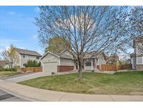 Charming single-Gathering home with well-maintained lawn and mature trees in a quiet neighborhood at 11296 Daisy Ct, Firestone, CO 80504