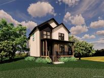 Charming two-story home with front porch and modern design elements at 1117 Lincoln Ave, Louisville, CO 80027