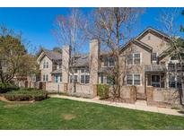 Charming townhomes feature lush front lawn, private patios, and beautiful architectural details at 1673 S Fulton St, Aurora, CO 80247