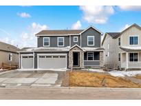 Charming two-story home with a three-car garage and a cozy front porch at 39192 Clymer St, Elizabeth, CO 80107