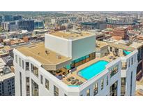 Elevated rooftop pool and patio with city views at 1625 Larimer St # 807, Denver, CO 80202