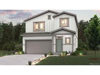 Charming two-story home featuring a gray two-car garage and an inviting, landscaped front yard at 2177 Flower Blossom Ave, Brighton, CO 80601