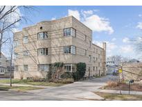 Beautiful brick apartment building featuring an elegant art deco design and a well-maintained yard at 1321 E 10Th Ave # 11, Denver, CO 80218