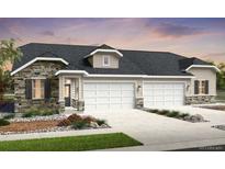 Charming single-story home with a stone facade, attached two-car garage, and well-manicured lawn at 3379 N Denali St, Aurora, CO 80019