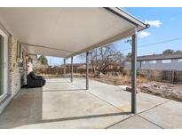This home features a spacious covered patio great for entertaining and relaxing outdoors at 2572 Beech Ct, Golden, CO 80401