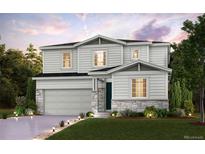 Charming two-story home featuring a two-car garage, stone accents, manicured lawn, and inviting landscaping at 14099 Bunny Hop Ln, Parker, CO 80134
