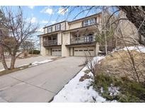 Two-story condo with personal garages and cozy balconys perfect for enjoying the outdoors at 395 Raspberry Ln, Monument, CO 80132