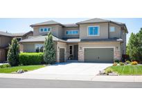 Beautiful two-story home featuring a concrete driveway and well-manicured front yard at 350 Andromeda Ln, Castle Rock, CO 80108
