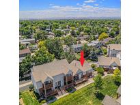 A lovely unit with tree coverage, well-maintained landscaping, and city views in the distance at 4220 E 119Th Pl # A, Thornton, CO 80233