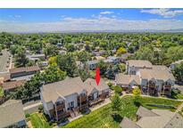 Stunning aerial view of the property showcasing its beautiful landscaping and proximity to lush green spaces at 4220 E 119Th Pl # A, Thornton, CO 80233