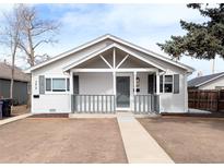 Charming single story home featuring a covered front porch and newly landscaped yard at 3417 W Walsh Pl, Denver, CO 80219