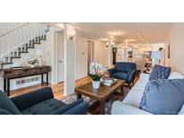 Inviting living room with hardwood floors, modern furniture, and stylish decor at 2163 S Grant St, Denver, CO 80210