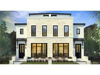 Modern two-story home featuring a stone facade, black window frames, and a well-manicured lawn at 680 S Gaylord St, Denver, CO 80209